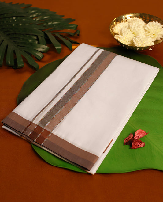 White Colour cotton single dhoti with 1.5 Inch Brown kara, crafted for traditional elegance & comfort, for men.