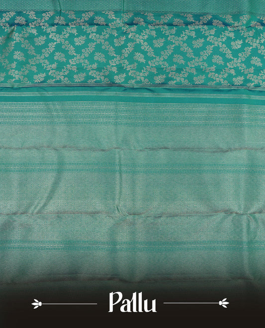 Peacock blue colour Kanchipuram pattern Manthrakodi saree with double pattern zari jacquard body, antique zari floral design, vertical oosi lines with diamond motifs, elegant zari border, and self jacquard blouse piece.
