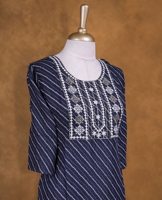 Dark blue colour kurti with styled with a thread pattern around neckline, print pattern across body, knee length design, and a sleeve .