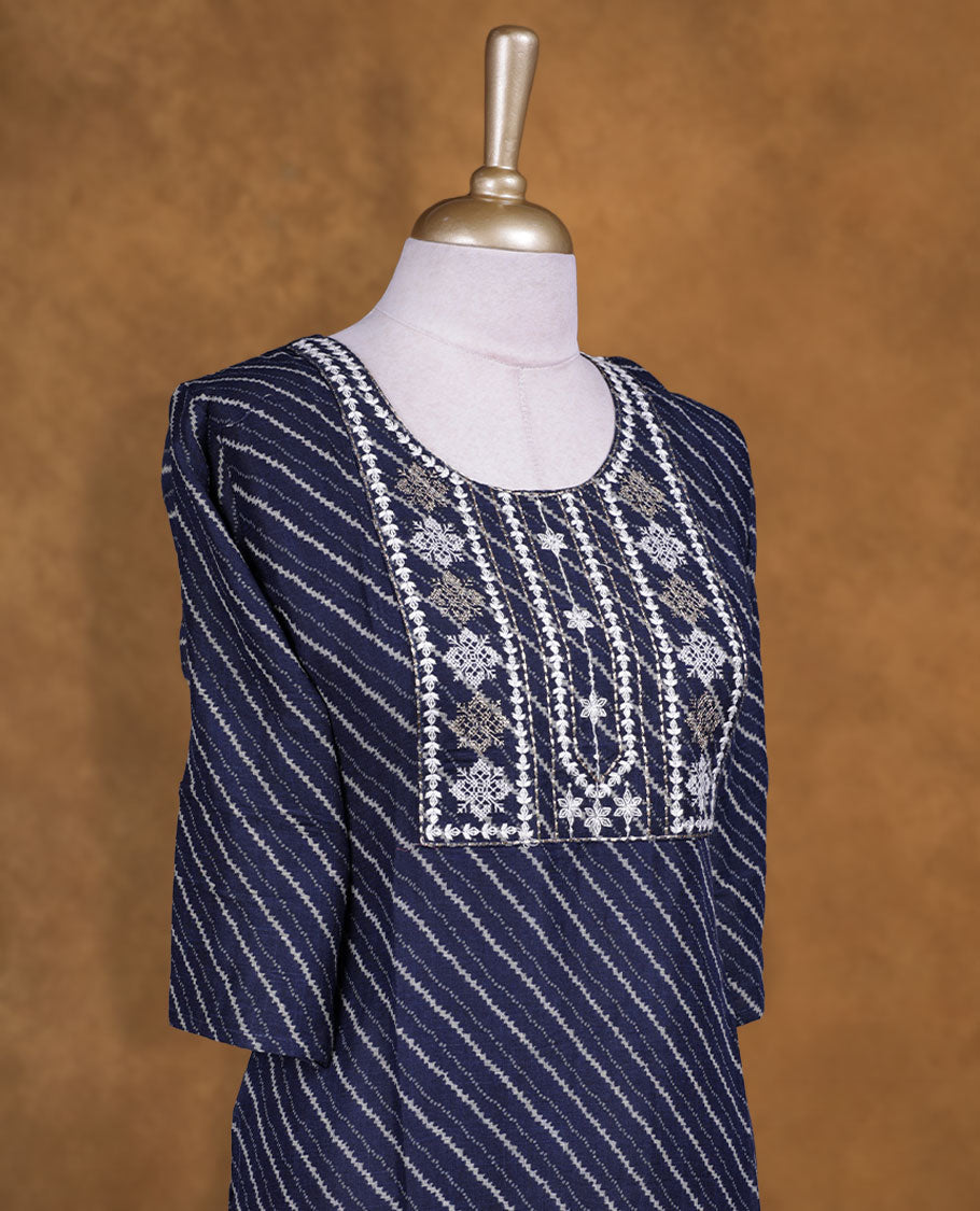 Dark blue colour kurti with styled with a thread pattern around neckline, print pattern across body, knee length design, and a sleeve .