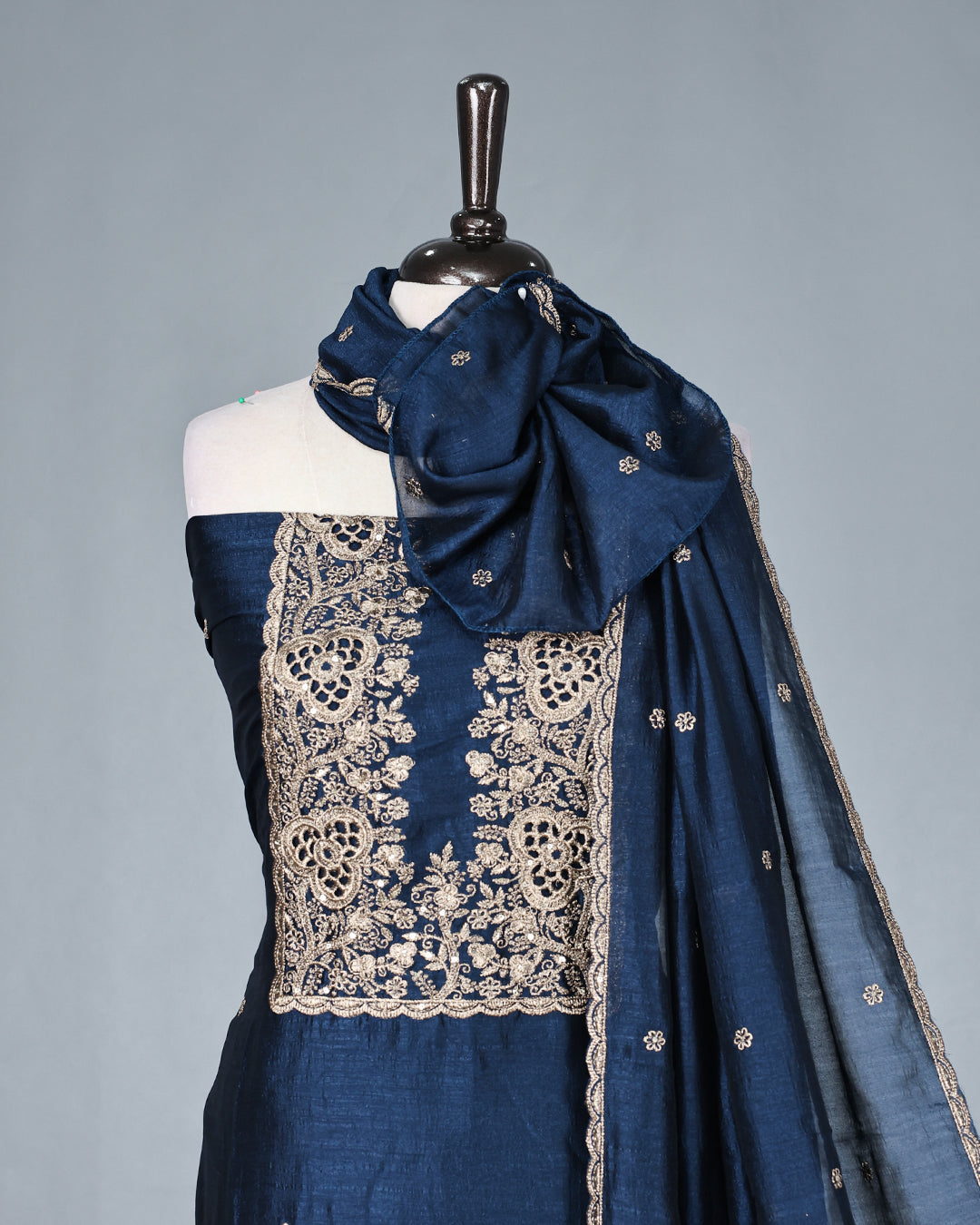 Navy Blue Colour Vijitra Silk Salwar Material Featuring Elegant White Thread Embroidery on the Front Panel, paired with a matching bottom & graceful embroidered Dupatta.