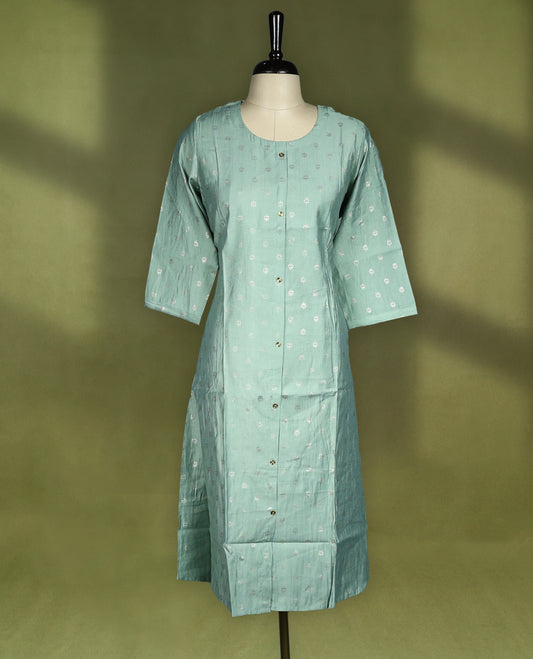 Pista green colour straightcut kurti crafted in soft fabric featuring subtle butta work all over, designed with a round neckline, front button placket and 3/4th sleeves.