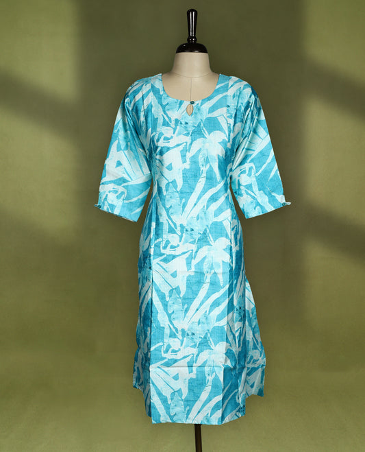 Bright turquoise blue straight cut kurti featuring bold Off white abstract prints, styled with a round neckline and keyhole detail, 3/4th sleeves and side slits, ideal for everyday summer wear.