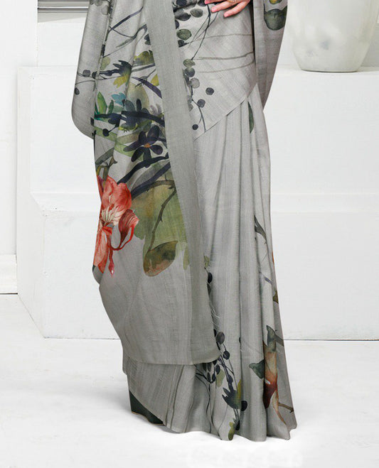 Grey colour Semi linen saree featuring vibrant multicolour floral digital prints on body and pallu, paired with a matching blouse.