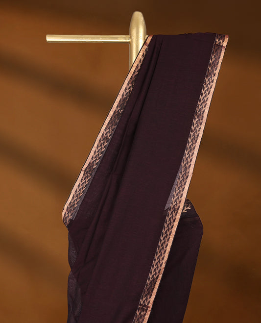 Dark chocolate colour soft khadi cotton saree with plain body, detailed woven Gold zari border, paired pallu with tussles, with matching blouse.