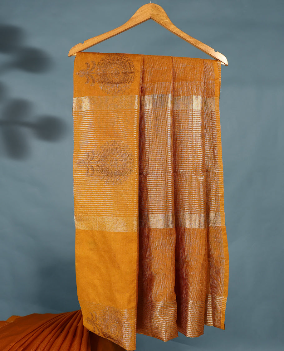 Mustard Colour Semi Tussar Saree showcases intricate Golden zari work on the body and border, paired with a matching blouse