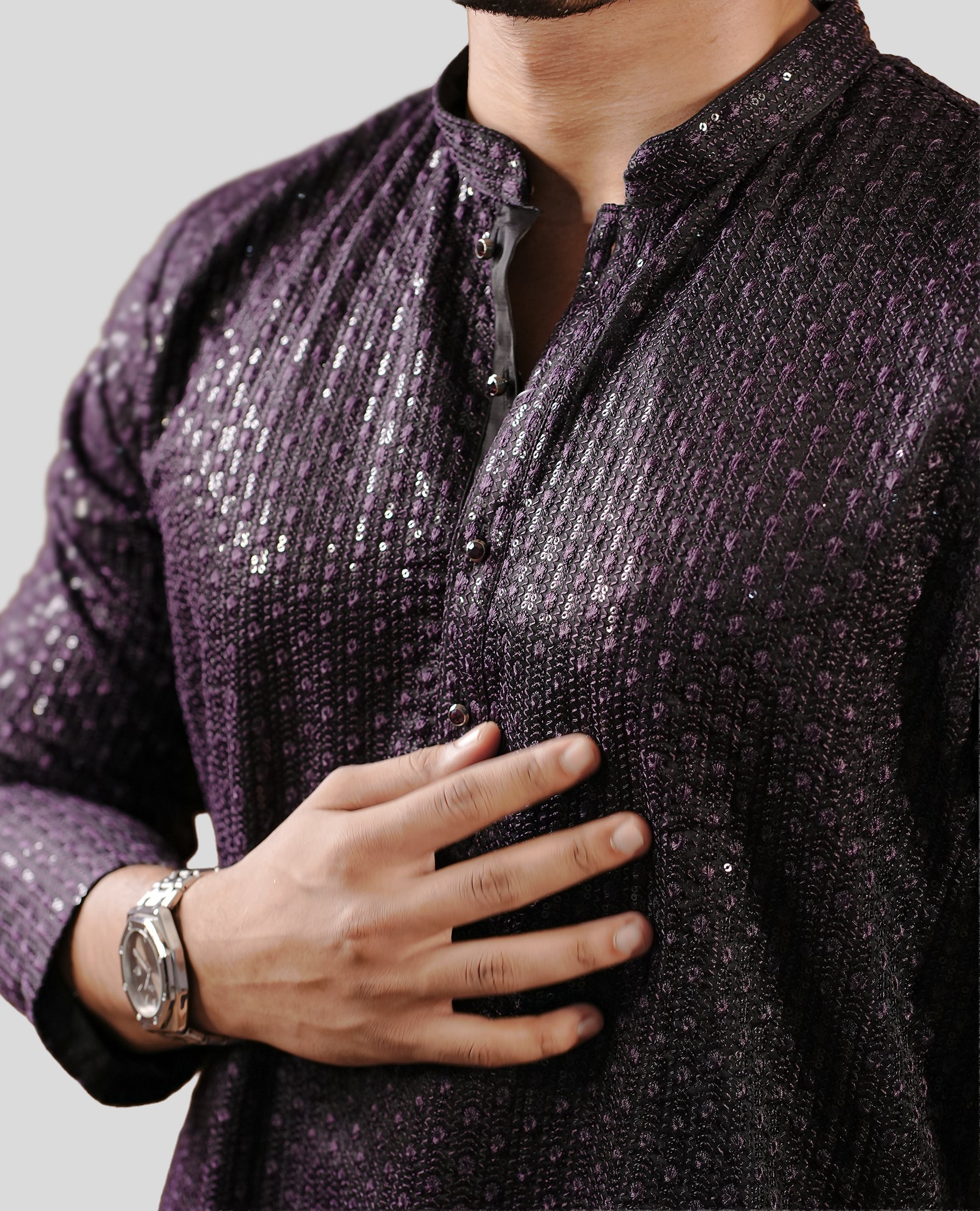 Dark purple colour men's kurta featuring elegant thread and sequins work on the body, complemented by full sleeves for a refined and festive look.
