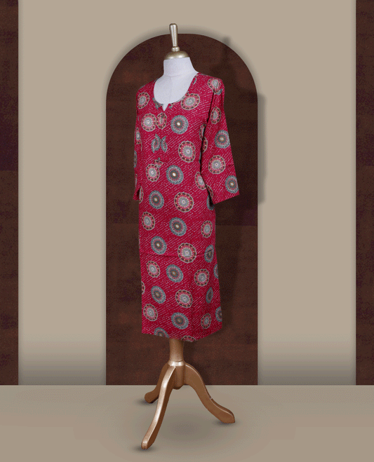 Magenta colour straight cut kurthi featuring elegant circular ethnic prints, styled with a round V notch neckline and comfortable 3/4th sleeves.