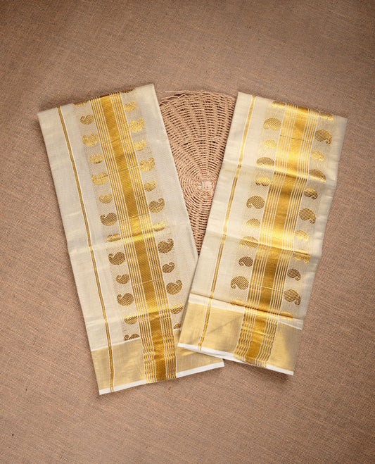 Light Gold colour tissue set mundu highlighting gold zari Mango pattern traditional border.