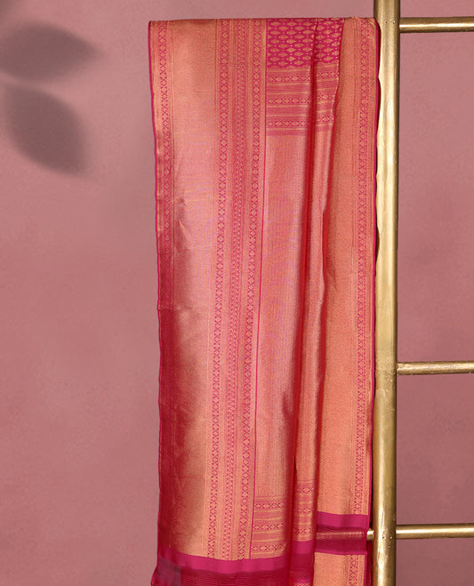 Magenta Kancheepuram Silk Brocade Saree having Brocade Body with Self Coloured Brocade Border and Blouse