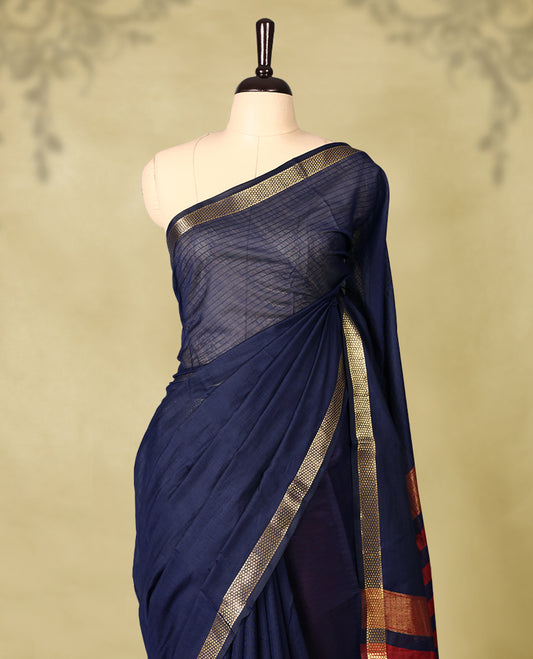 Navy Blue colour chanderi cotton saree with fine striped body, mangalgiri border, grand pallu featuring Deep Red and gold zari stripes, with matching blouse.