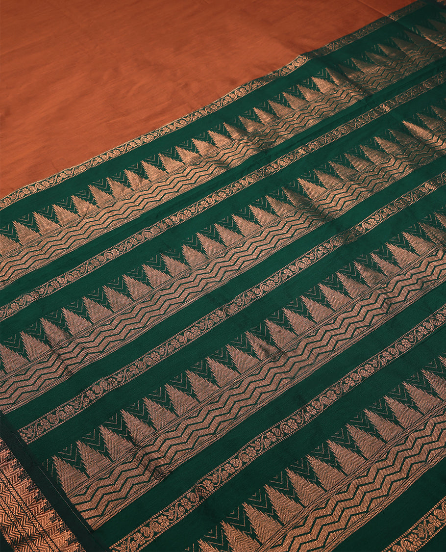 Burnt Orange Colour Mixed Kalyani Cotton Saree having Plain Body with Dark Green Colour Border and Blouse