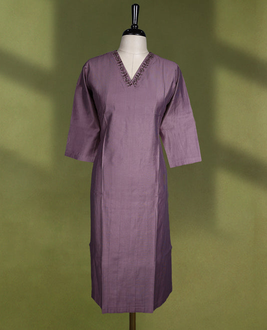Pastel Purple colour kurti featuring a V neckline with delicate lace detailing and three-quarter sleeves, crafted from a subtly textured fabric