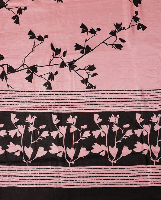 Pastel pink colour semi printed saree featuring black florak kodi prints across the body, finished with a Golden Zari border, with matching blouse