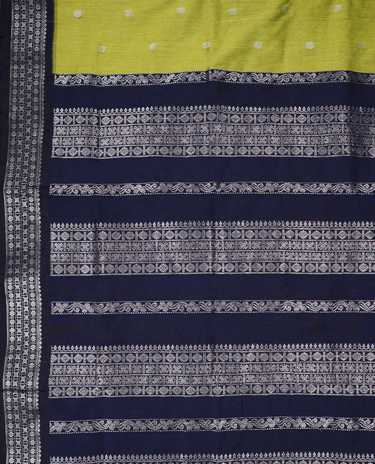 Lemon Green colour mixed Kalyani cotton saree featuring Silver zari Flower motifs throughout the body, paired with a Deep Navy Blue colour traditional border and pallu, with matching blouse