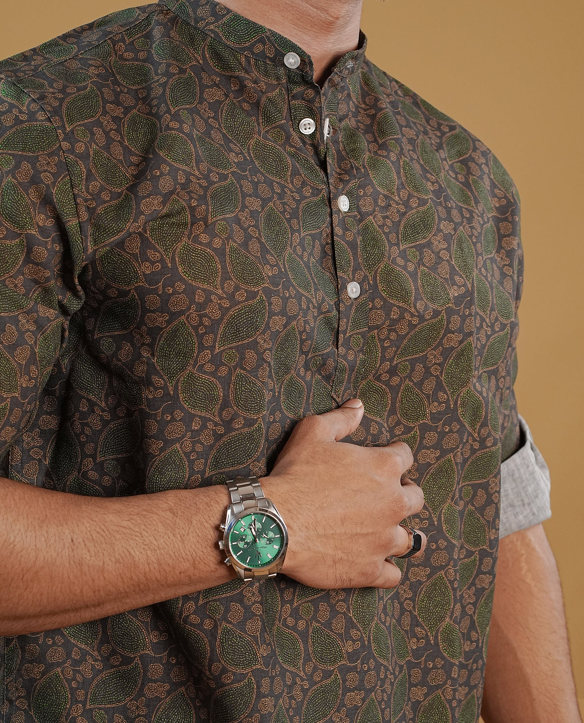 Mehandi colour men's kurta featuring elegant Print on the body, complemented by sleeves for a refined and festive look.