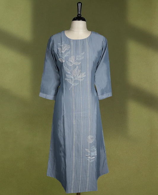 Slate blue colour kurti featuring a round neckline and three quarter sleeves, highlighted with vertical thread detailing and soft white floral embroidery