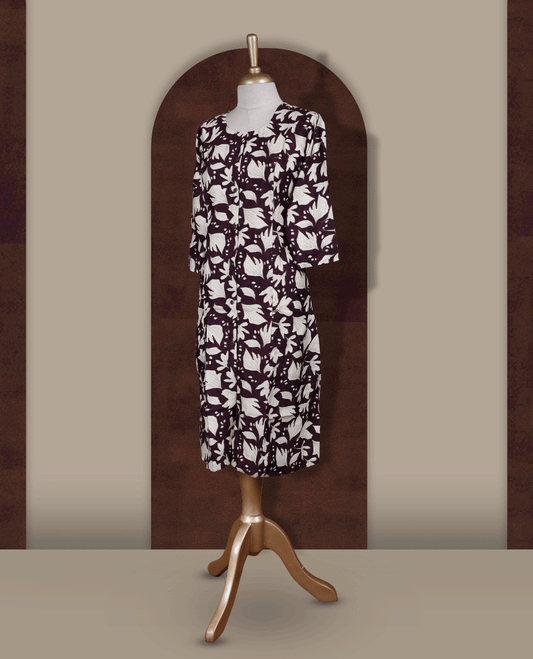 Wine colour kurthi featuring bold off white colour floral prints, a round neckline with front button detailing, and comfortable 3/4th sleeves & Designed in a flattering A line silhouette, perfect for casual outings and everyday elegance.