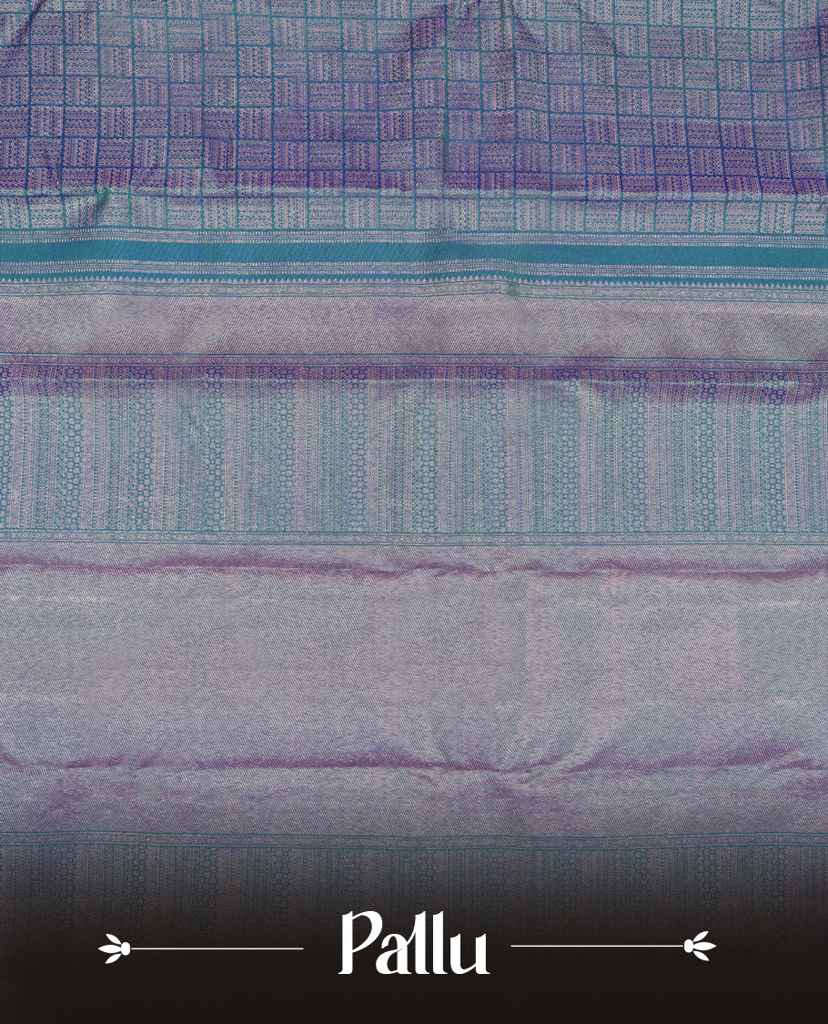 Peacock blue colour Kanchipuram pattern Manthrakodi saree featuring intricate geometric antique copper zari brocade design across the body, beautifully complemented with a matching self brocade blouse piece.