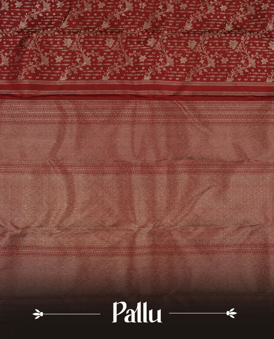 Ruby red colour Kanchipuram pattern Manthrakodi saree featuring antique kodi zari jacquard design on the body, complemented with a graceful self turning border and a matching zari jacquard blouse piece.