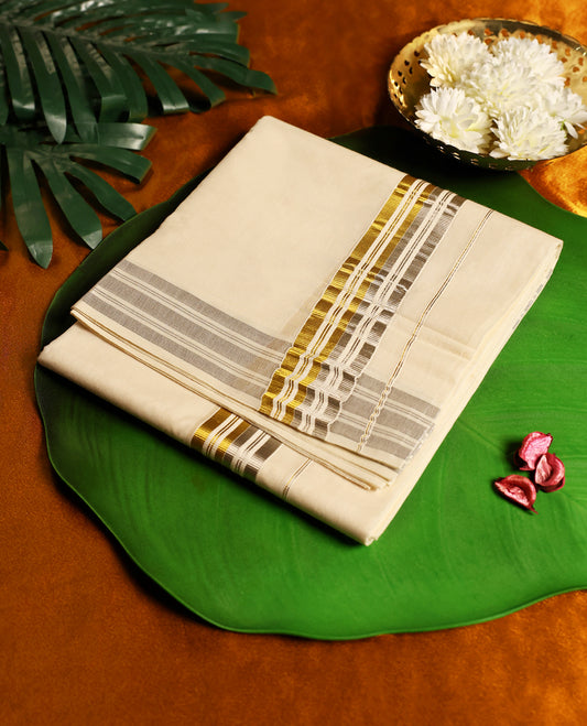 Off white colour pure cotton double dhoti featuring elegant golden and silver zari stripes on the border, offering a perfect blend of comfort and traditional charm, ideal for weddings, festivals, and cultural occasions.