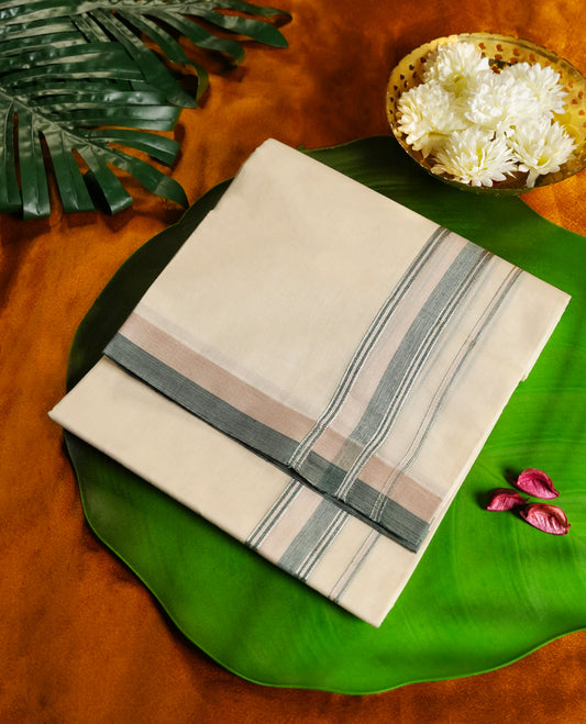 Beige colour cotton single dhoti featuring a soft grey and pastel pink kara with clean line detailing & Designed for daily comfort and traditional grace, ideal for rituals, cultural events, and festive wear.