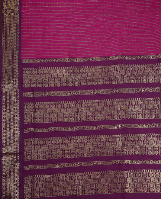 Magenta colour Kalyani cotton saree featuring silver zari checkered weave throughout the body, paired with a rich Purple colour traditional zari woven border and pallu, with matching blouse.