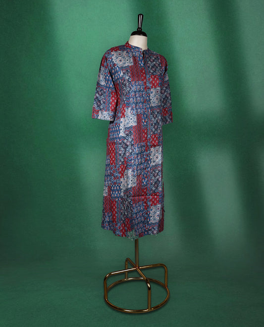 Multicolour colour kurti adorned with vibrant patchwork style prints in shades of red, blue, and white, featuring a mandarin collar, front placket, and three quarter sleeves a bold and comfortable choice for everyday fashion.