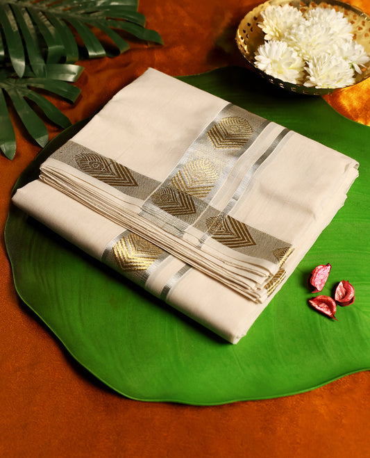 Off white colour pure handloom cotton dhoti featuring a silver zari border with golden woven motifs, crafted for traditional elegance, breathable comfort, and perfect for festive or cultural occasions.