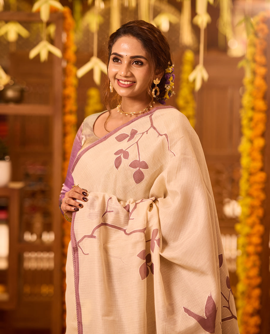 Cream colour Tussar cotton Kota saree featuring delicate Block printed leaves motifs across the body, highlighted with a subtle lavender border, paired with a matching blouse