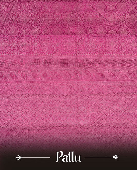 Magenta colour Kanchipuram pattern Manthrakodi saree adorned with antique copper zari floral creeper design featuring traditional peacock and elephant motifs, complemented by a rich zari jacquard border and blouse piece.