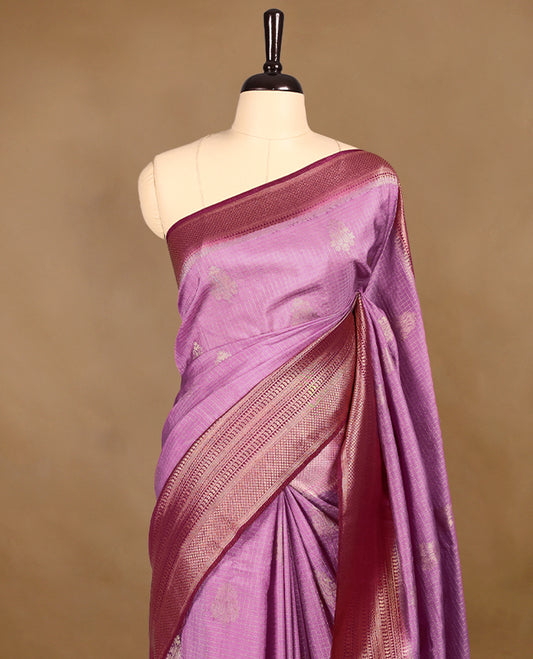 Onion Pink Colour semi Banaras georgette saree featuring golden Zari checks with double mango motifs on the body, complemented by a Wine traditional border and a matching blouse.