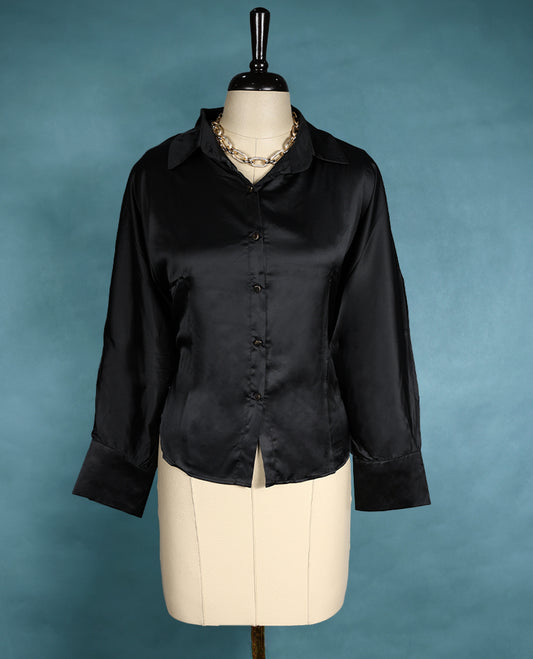 Black satin finish shirt with a collared neckline, button down front, and long sleeves for a sleek and elegant look