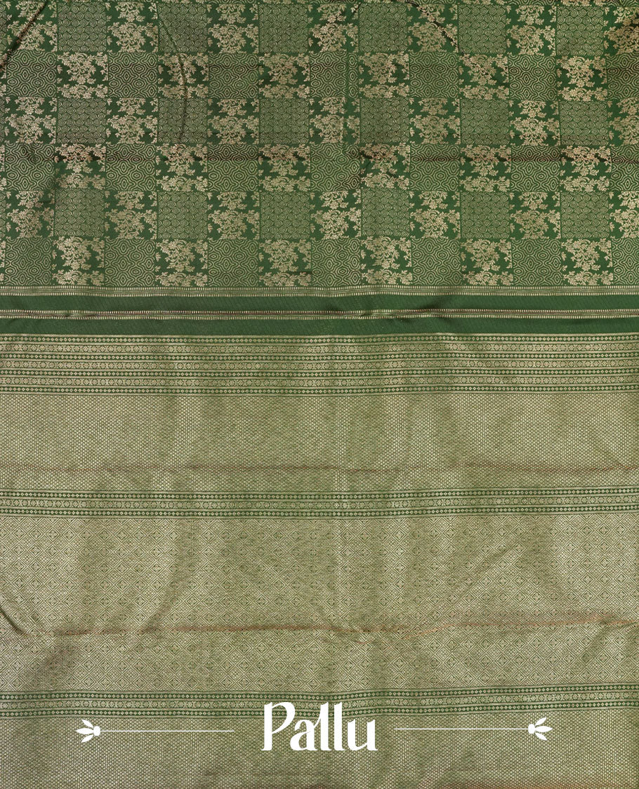 Bottle green colour Kanchipuram pattern Manthrakodi saree featuring intricate geometrical design and turning border in antique gold zari jacquard, crafted in rich Kanchipuram silk, paired with a matching jacquard blouse piece.