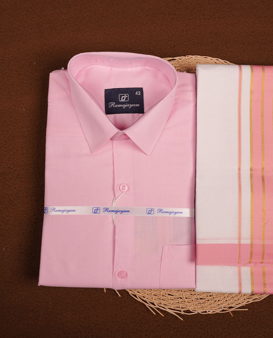 Light Pink Colour shirt paired with a matching dhoti, finished with a Pink and gold border.