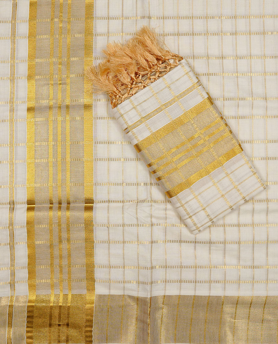 Off white colour Cotton Set Mund featuring self-woven stripe checks, enhanced with a broad traditional gold zari kasavu border and golden tassels.