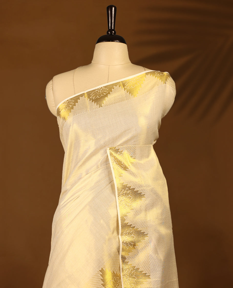 Gold colour Tissue Kerala saree featuring Plain body and a beautifully woven Gold Kasavu border with floral & Temple Motifs, paired with a matching blouse perfect for festive occasions.