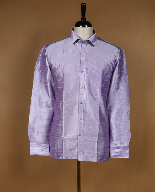 Lavender lilac colour DH men’s shirt in a relaxed formal fit featuring a lustrous semi silk finish, full sleeves, classic collar, and chest pocket ideal for festive and traditional occasions.