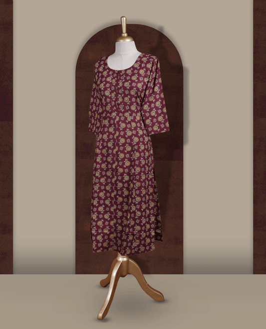 Grape colour kurthi adorned with  floral prints, featuring a classic round neckline with front buttons and comfy 3/4th sleeves.