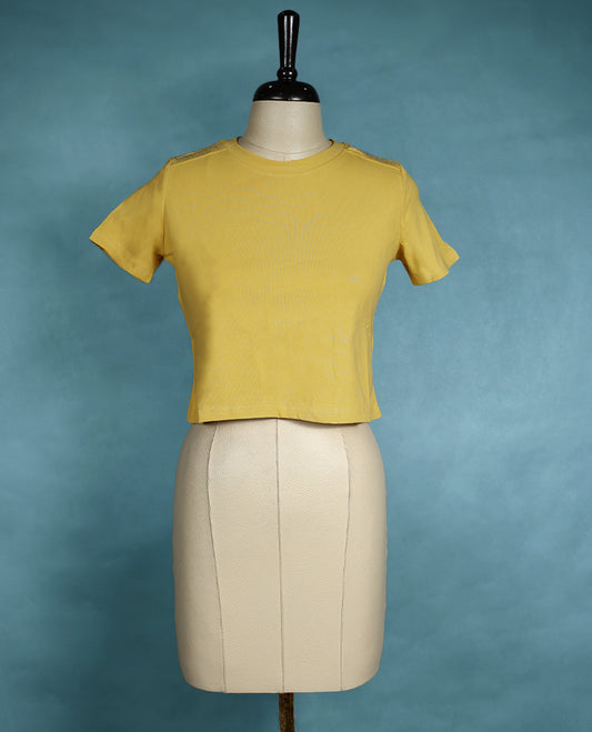 Mustard yellow round neck T shirt with short sleeves, featuring a fitted silhouette and minimal design for a sleek, everyday look.