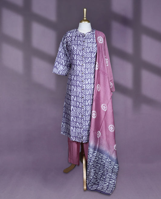 Pastel purple and mauve cotton salwar set with round neck and elbow sleeves featuring geometric print on the kurta body with button detailing paired with matching plain bottom and dual tone printed dupatta