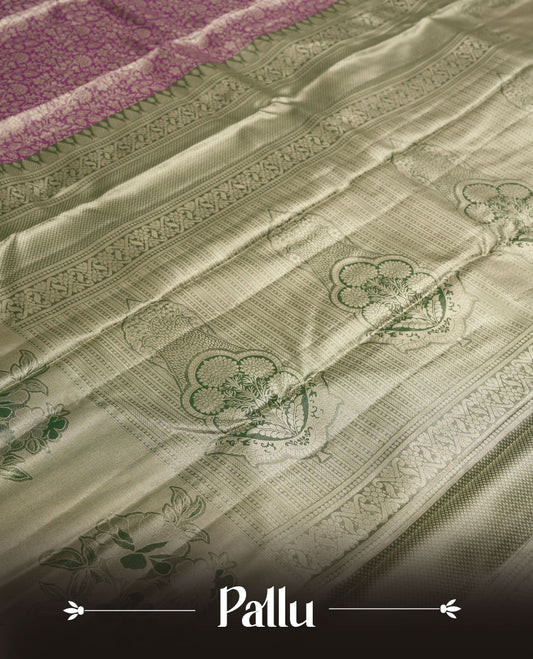 Purple colour and Antique silver Zari Tissue Brocade Saree features intricate floral Motifs on body and pastel green colour fancy border & pallu with purple floral patterns, paired with matching blouse