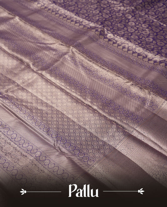 Purple colour and Antique silver Zari Tissue Brocade Saree features intricate Motifs on body and traditional border & pallu with floral patterns, paired with matching blouse
