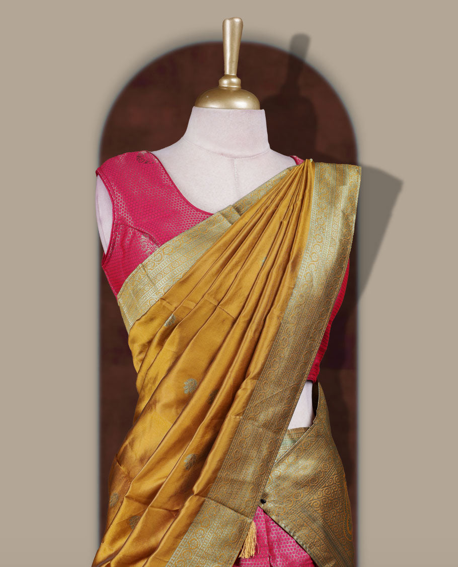 Rani Pink and mustard colour Dhavani set featuring a Rani pink colour skirt with contrast Mustard colour border with rich silver zari pattern, paired with a contrasting Mustard dupatta detailed with silver motifs
