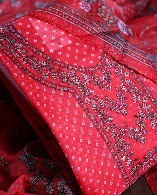 Rose red colour churidhar material adorned with delicate floral, stone and vine prints, enhanced by a contrast border & Paired with a plain matching bottom, perfect for festive wear and casual elegance.