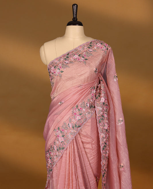 Pastel Pink Crush Soft Silk saree featuring Floral Thread Works on the body, complemented by delicate floral embroidery border and a matching  blouse.