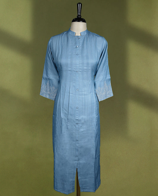 Soothing sky blue colour kurti featuring a mandarin collar and three quarter sleeves, adorned with fine pintuck detailing and delicate embroidery on the cuffs.