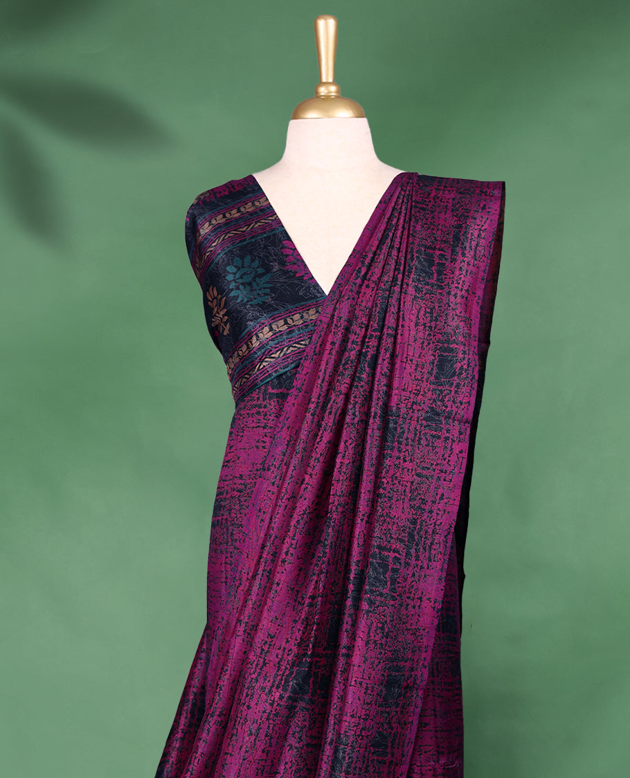 Deep magenta colour Manipuri saree features an abstract black textured pattern throughout the body, creating a bold contemporary statement, without border, and comes with a matching blouse.
