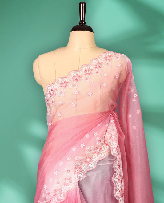 Light Pink and White colour double shade organza saree with delicate floral embroidery on body, intricately embroidered scallop border, floral embroidered design on pallu, with matching blouse