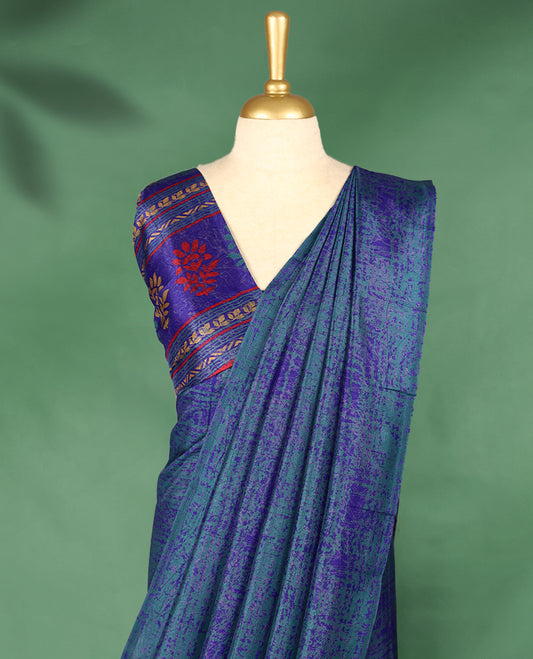 Teal blue colour Manipuri saree features a body with subtle royal blue textured patterns, without Border, and comes with a matching blouse.